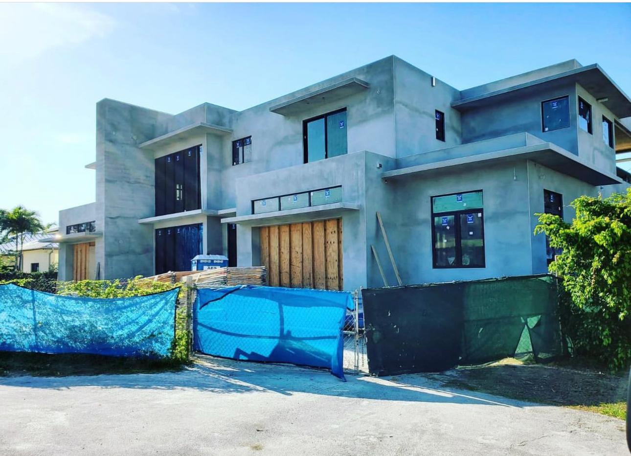 Modern new construction with impact windows installed - window replacement Naples FL